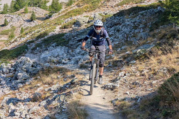 John climbing a sandy path to the Col du Tronchet