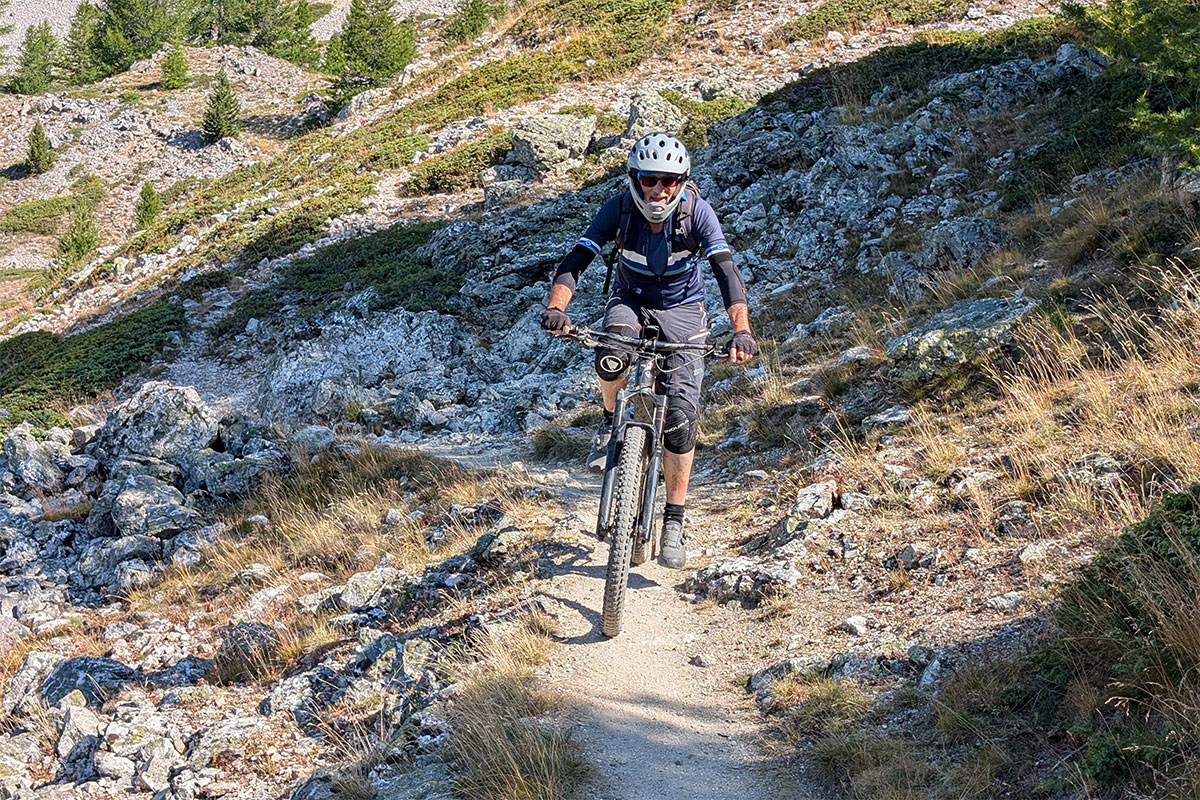 John climbing a sandy path to the Col du Tronchet