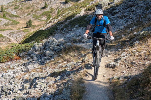 Lloyd climbing a sandy path to the Col du Tronchet