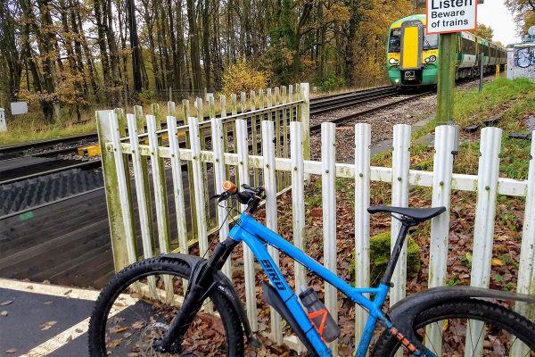 Ashtead crossing with Class 377 EMU