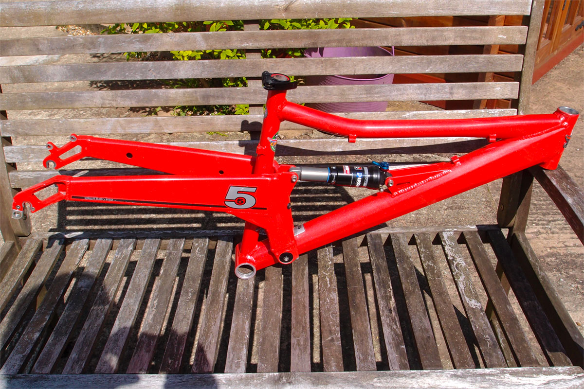 Orange Five frame in sparkle red